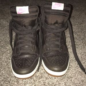 Women’s Nike Dunk Sky Hi-tops.